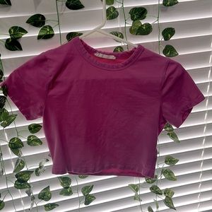 a pink crop top
